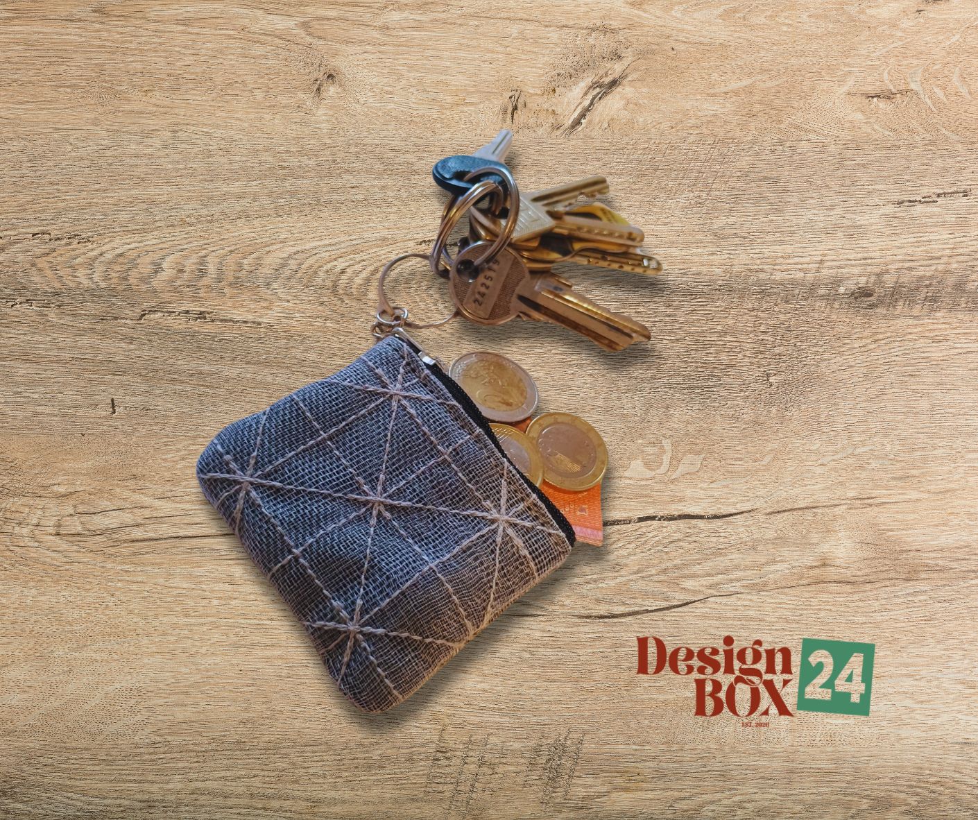  »Schlüsselanhänger aus Moskitonetz Grau«           